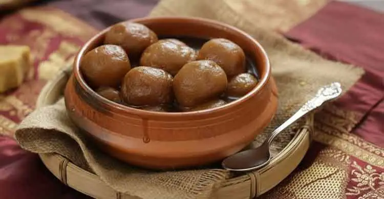 খেজুর গুড়ের রসগোল্লা, ছবি: এআই দিয়ে বানানো